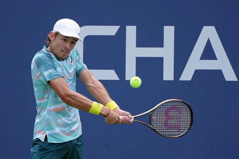 De Minaur survives first.